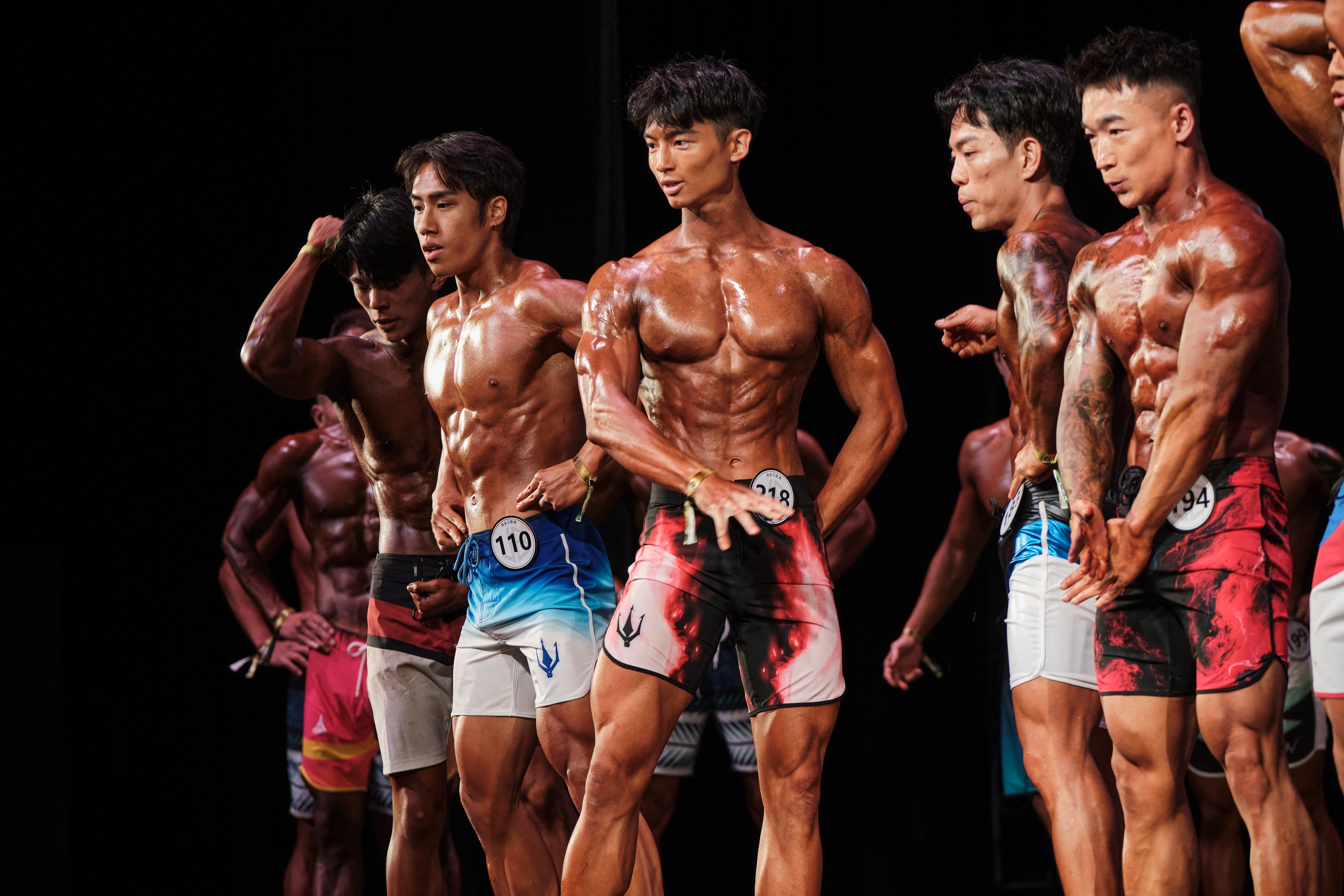 Vincent on stage alongside other competitors