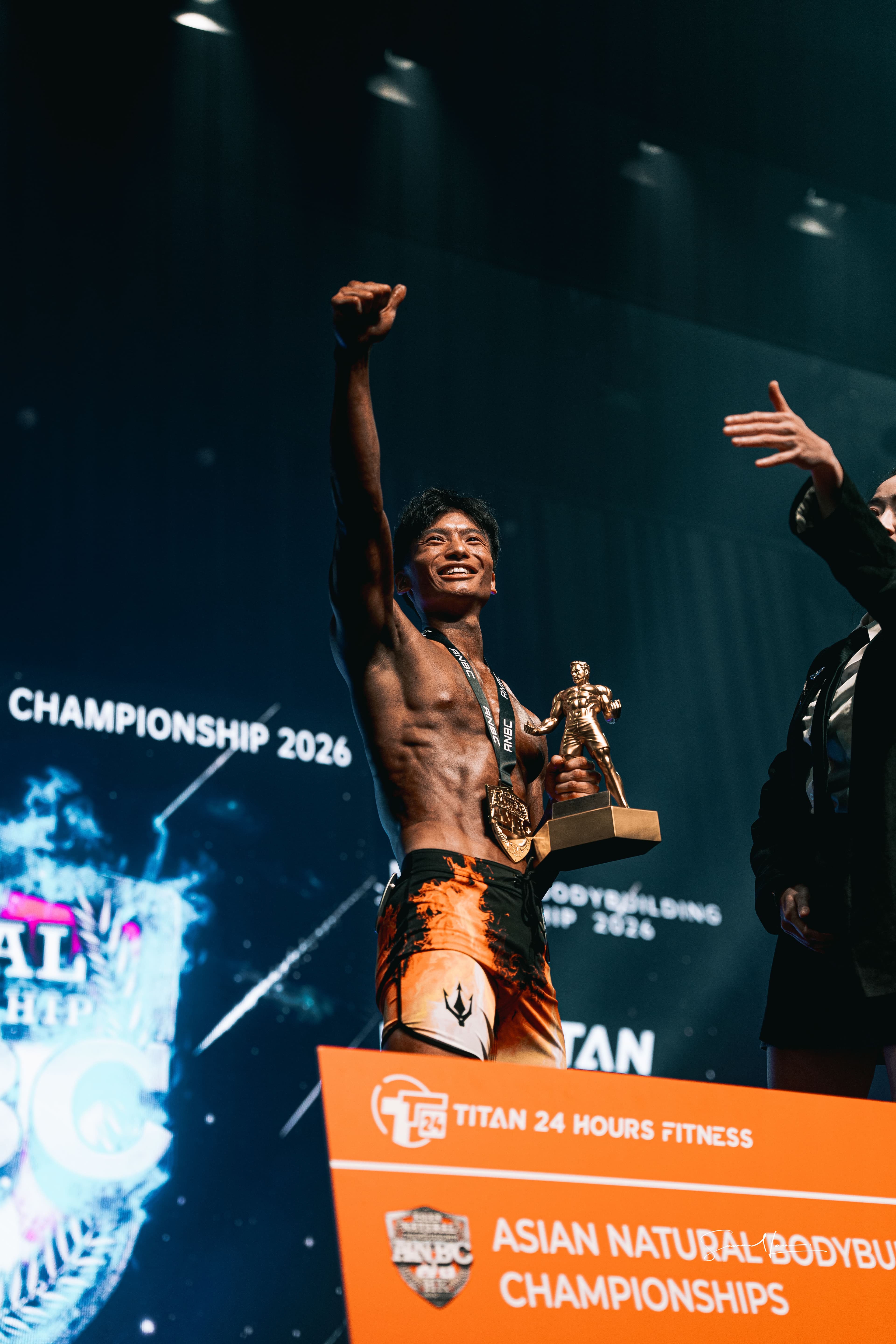 Vincent celebrating with the trophy at the ANBC Asian Championships